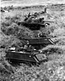 Tanks and ACAV's form defense perimeter at bridge site, Vietnam