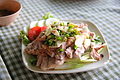 'Mu manao': grilled pork with a spicy lime-juice dressing