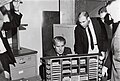 MSFC officials, including Dr. Wernher von Braun (on left) looking at an LVDC