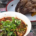 'Yam tin khwai' is a spicy and sour Northern Thai water buffalo hoof soup