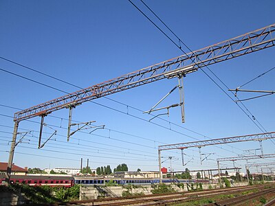 Gantry with old and new suspended equipment at Grivita railway station, Bucharest.