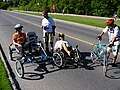 Some forms of self-propelled travel: (l-r) quadracycling, roller blading, tricycling, bicycling.