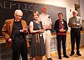 Each of the faculty of 2012's Skeptic's Toolbox are presented by long-time attendees Carol and Ben Baumgartner, with an Honorary In The Trenches Award. Ray Hyman, Lindsay Beyerstein, James Alcock, Harriet Hall and Loren Pankratz[45]