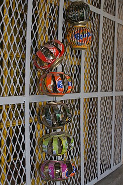 Direct recycled soft drinks tin cans into lanterns, Namibia