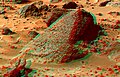 This view of Wedge was produced by combining the "Super Panorama" frames from the IMP camera. Super resolution was applied to help to address questions about the texture of this rock and what it might tell us about its mode of origin. The composite color frames that make up this anaglyph were produced for both the right and left eye of the IMP. Each composite consists of 7 frames, taken with different color filters that were enlarged by 500% and then co-added using Adobe Photoshop to produce, in effect, a super-resolution panchromatic frame that is sharper than an individual frame would be. These panchromatic frames were then colorized with the red, green, and blue filtered images from the same sequence. The color balance was adjusted to approximate the true color of Mars. The anaglyph view was produced by combining the left with the right eye color composite frames by assigning the left eye composite view to the red color plane and the right eye composite view to the green and blue color planes (cyan), to produce a stereo anaglyph mosaic. This mosaic can be viewed in 3-D on your computer monitor or in color print form by wearing red-blue 3-D glasses. Mars Pathfinder is the second in NASA's Discovery program of low-cost spacecraft with highly focused science goals. The Jet Propulsion Laboratory, Pasadena, CA, developed and manages the Mars Pathfinder mission for NASA's Office of Space Science, Washington, D.C. JPL is a division of the California Institute of Technology (Caltech). The left eye and right eye panoramas from which this anaglyph was created is available at PIA02405 andPIA02406