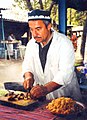 Image 20A man makes plov, the national dish of Tajikistan. (from Culture of Tajikistan)