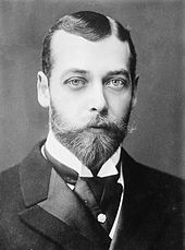 Pale-eyed young man with a beard and moustache