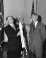 NASA Administrator T. Keith Glennan shows Associate Administrator Robert C. Seamans a model of the Mercury Redstone rocket on July 19, 1960.