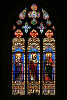 A brilliantly coloured window at Cassagnes-Bégonhès, Aveyron.