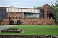 Image 30A reconstructed gateway of Mamucium fort (from History of Manchester)