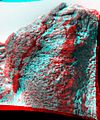 This anaglyph view of Chimp, south southwest of the lander, was produced by combining two right eye frames taken from different viewing angles by Sojourner Rover. One of the right eye frames was distorted using Photoshop to approximate the projection of the left eye view (without this, the stereo pair is painful to view). The left view is assigned to the red color plane and the right view to the green and blue color planes (cyan), to produce a stereo anaglyph mosaic. This mosaic can be viewed in 3-D on your computer monitor or in color print form by wearing red-blue 3-D glasses. Mars Pathfinder is the second in NASA's Discovery program of low-cost spacecraft with highly focused science goals. The Jet Propulsion Laboratory, Pasadena, CA, developed and manages the Mars Pathfinder mission for NASA's Office of Space Science, Washington, D.C. JPL is a division of the California Institute of Technology (Caltech).