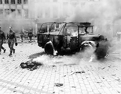 A boy killed and set on fire by a V-2 rocket attack in Belgium on November 27, 1944