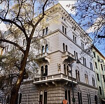 The elegant pile built for Count Henrik Reusz-Ráthonyi in 1898-9 at Krúdy utca 11 (the architect is unknown). A rural landowner, horse-breeder, and knight of the Order of Emperor Franz-Joseph, Reusz-Ráthonyi had a flat on the first floor – whose balcony is overlooked by the statue of a winged lion, symbols of Mark the Evangelist and Venice – and his coat of arms is still to be seen over the main entrance. The building later became a Catholic Girls’ College which, heroically, sheltered 150 Jews from Hungary’s Nazi regime during WWII. The building was in a seriously dilapidated condition for many years, but was beautifully restored 2016-18.[81][82][83]