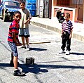 Image 3Plaquita, a Dominican street version of cricket. The Dominican Republic was first introduced to cricket through mid-18th century British contact, but switched to baseball after the 1916 American occupation. (from History of cricket)