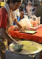 Making 'roti sai mai'