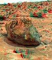 Yogi is a meter-size rock about 5 meters northwest of the Mars Pathfinder lander and was the second rock visited by the Sojourner Rover's alpha proton X-ray spectrometer (APXS) instrument. This view of was produced combining the "Super Panorama" frames from the IMP camera. Super resolution was applied to help to address questions about the texture of this rock and what it might tell us about its mode of origin. The composite color frames that make up this anaglyph were produced for both the right and left eye of the IMP (in this case, the view of Yogi is a mosaic). These composites consist of 7 frames in the right eye and 8 frames in the left eye, taken with different color filters that were enlarged by 500% and then co-added using Adobe Photoshop to produce, in effect, a super-resolution panchromatic frame that is sharper than an individual frame would be. These panchromatic frames were then colorized with the red, green, and blue filtered images from the same sequence. The color balance was adjusted to approximate the true color of Mars. The anaglyph view was produced by combining the left with the right eye color composite frames by assigning the left eye composite view to the red color plane and the right eye composite view to the green and blue color planes (cyan), to produce a stereo anaglyph mosaic. This mosaic can be viewed in 3-D on your computer monitor or in color print form by wearing red-blue 3-D glasses. Mars Pathfinder is the second in NASA's Discovery program of low-cost spacecraft with highly focused science goals. The Jet Propulsion Laboratory, Pasadena, CA, developed and manages the Mars Pathfinder mission for NASA's Office of Space Science, Washington, D.C. JPL is a division of the California Institute of Technology (Caltech). The left eye and right eye panoramas from which this anaglyph was created is available at PIA02405 andPIA02406