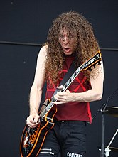 Marty Friedman playing the guitar