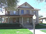 The Josephine Frankenberg House was built in 1910 and was originally located at 129 E. University Dr. The house was listed in the National Register of Historic Places on January 29, 1981, reference #81000138. The house was purchased by Josephine Frankenberg in 1919. Josephine nursed many victims back to health during the Great Influenza epidemic in 1918. She rented rooms on the second floor to boarders, mostly single teachers employed at the Normal School. The house remained in her possession until her death in 1949. It was dismantled and rebuilt at 150 S. Ash Ave in 1992 in Tempe's Olde Towne Square. Now lacking integrity of location, this property remains eligible for listing in the National Register of Historic Places under National Park Service Criterion B and C. The house is also listed as "Historic" in the Tempe Historic Property Survey.