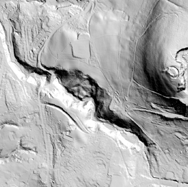 A relief plan showing the land sloping westwards away from the hill which Buckton Castle sits on, and residential areas on lower land.