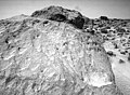 A close-up view of the rock "Moe" in the Rock Garden at the Pathfinder landing site. Moe is a meter-size boulder that, as seen from Sojourner, has a relatively smooth yet pitted texture upon close examination. Such a texture is seen on Earth on rocks that have been abraded by wind in a process that is analogous to sand blasting. This view of Moe shows two faces on the rock, one (left side of the rock) facing north-northeast and the other (right side) facing east. These two faces are thought to have been pitted and fluted by strong, "sand"- carrying winds from the northeast. This image and PIA01564(left eye) make up a stereo pair. Mars Pathfinder is the second in NASA's Discovery program of low-cost spacecraft with highly focused science goals. The Jet Propulsion Laboratory, Pasadena, CA, developed and manages the Mars Pathfinder mission for NASA's Office of Space Science, Washington, D.C. JPL is an operating division of the California Institute of Technology (Caltech).