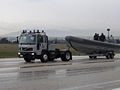 A boat of the Hellenic Coast Guard towed for a parade.