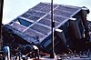 Mexico City Earthquake, September 19, 1985. Eight-story frame structure with brick infill walls broken in two.