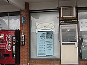 A 2008 election poster in front of a store in Village of New Square, Town of Ramapo, New York, entirely in Yiddish. The candidates' names are transliterated into Hebrew letters.