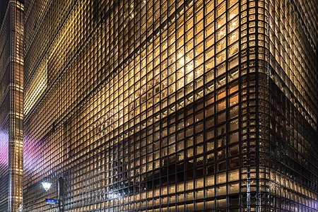 "Exterior_view_of_the_illuminated_facade_of_Maison_Hermès,_Ginza,_Tokyo,_Japan.jpg" by User:Basile Morin