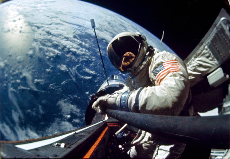 Buzz Aldrin in space, with the Gemini 12 spacecraft and Earth