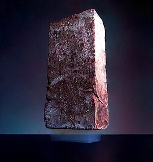 A 2.5 kg brick is supported on top of a piece of aerogel weighing only 2 grams