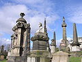 Image 19The Glasgow Necropolis is a Victorian cemetery in Glasgow. It sits on a hill above, and to the east of, St. Mungo's Cathedral. It was conceived as a Père Lachaise for Glasgow, and subsequently established by the Merchants' House of Glasgow in 1831. Fifty thousand individuals have been buried in approximately 3500 tombs. Photo Credit: S.moeller