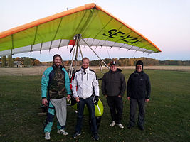 Photographers after a microlight aircraft tour, 2013