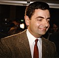 Mr. Bean (Rowan Atkinson), brita komikulo.