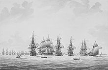 Print of Five sailing ships, four seen stern on, and the fifth from the side. A town and coastline in the background, with a line of distant ships in front of it.