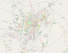 Mapa konturowa Erywania, w centrum znajduje się punkt z opisem „Armeńska Akademia Nauk”