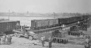 A train crosses the bridge