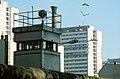 border guards feeding birds on watchtower, November 14, 1989