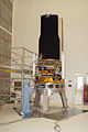 Spitzer in a hangar at Kennedy Space Center being prepared to be placed atop its rocket.