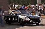 Porsche 911 i polisutförande, svart/vita dekoren.