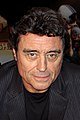 Ian McShane, intérprete de Teddy Bass.