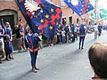 Siena, Italy: Parade of contrada "Nicchio" (English: "Seashell") through the old city