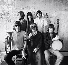 Jefferson Airplane photographed by Herb Greene in his dining room, San Francisco, late 1966; top row from left: Jack Casady, Grace Slick, Marty Balin; bottom row from left: Jorma Kaukonen, Paul Kantner, Spencer Dryden