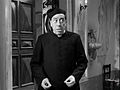 Don Camillo (Fernandel) in una scena.