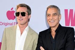 Brad Pitt and George Clooney at the premiere of "Wolfs" held at TCL Chinese Theatre on September 18, 2024 in Los Angeles, California.  (Photo by Gilbert Flores/Variety via Getty Images)