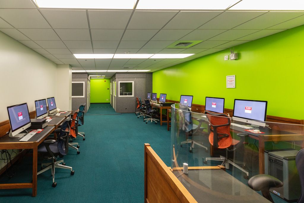 Large room with many computer workstations