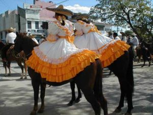 Two esquestrians get ready for the parade