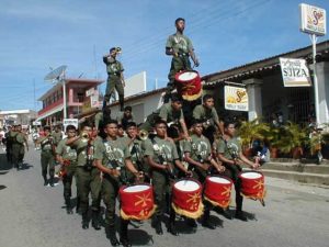 On November 20th, the Army Band performs 'La Grand Pirámide' in a parade