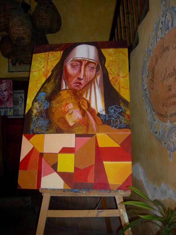 A painting of Mary and Jesus stands in a hotel doorway in San Miguel de Allende. The altars are dedicated the Virgin of Sorrows © Edythe Anstey Hanen, 2014