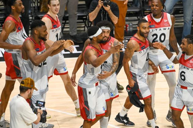 Ottawa BlackJacks exchange congratulations after a win