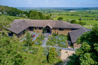 The Gables is a bungalow in a six-acre plot with views of the north Cotswolds